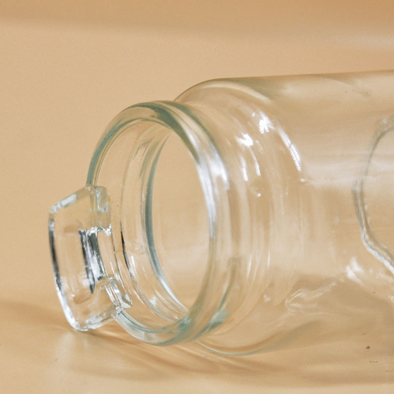 برطمان زجاج 100 ملي لحفظ وتخزين التوابل والزعفران والمستكة بغطاء شكل خشبي ومعلقة لسهولة الأستخدام - الصورة 2