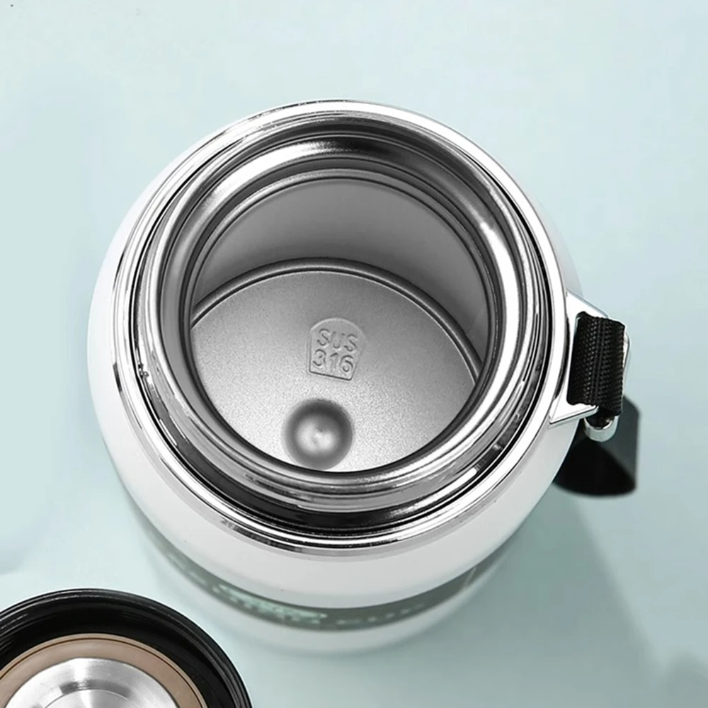 ترمس حراري محمول استانليس ستيل حافظ لحرارة المشروبات حتي 12 ساعة 800 ملي بغطاء محكم الغلق و مصفاه للسفر والرحلات - الصورة 5