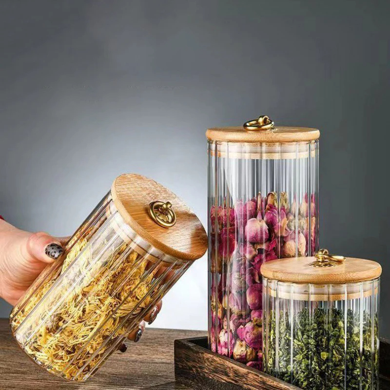 طقم برطمانات زجاج 3 قطع باحجام مختلفة بغطاء خشبي بحلقة معدن جولد لحفظ وتنظيم الحبوب والبقوليات والتوابل والشاي والسكر - الصورة 5