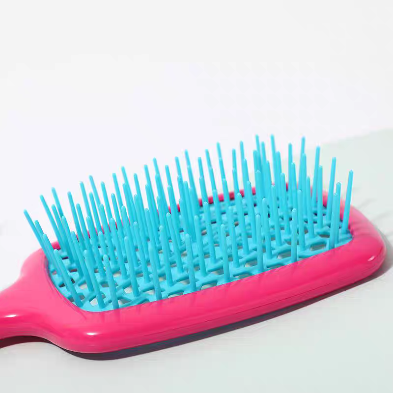 فرشة شعر مفرغة لتسريح وفك تشابك الشعر - الصورة 7