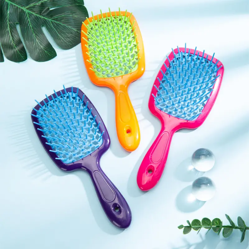 فرشة شعر مفرغة لتسريح وفك تشابك الشعر - الصورة 3