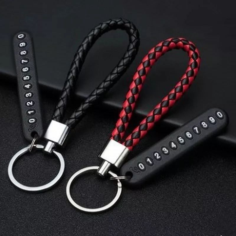 عرض 2 ميدالية مضفرة من الجلد لمفاتيح السيارة والمنزل